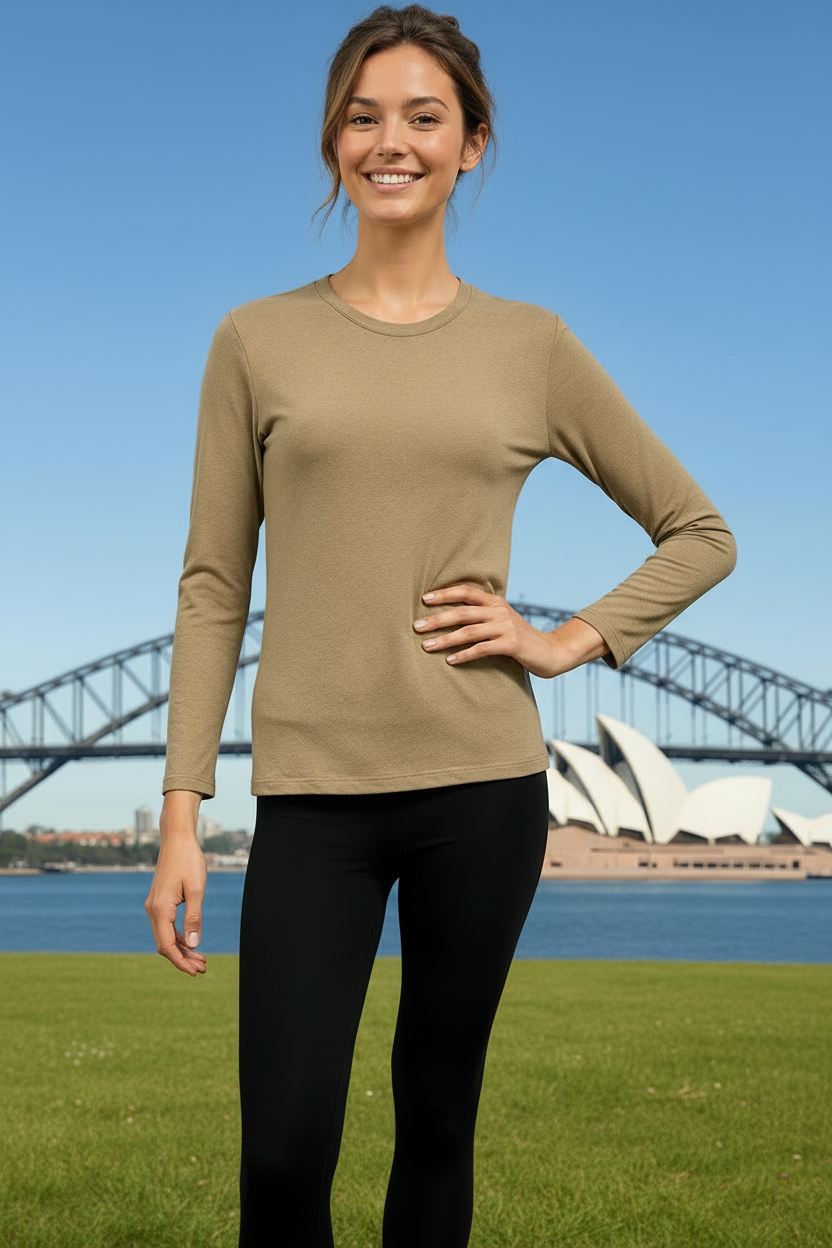 Woman wearing a pink long-sleeve top that's super soft