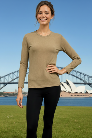 Woman wearing a beige long-sleeve top that's super soft