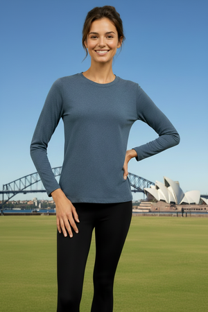 Woman wearing a super soft blue long-sleeve top. 