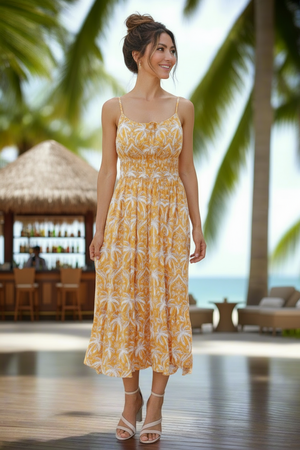 Woman in a yellow floral dress standing in a tropical setting with palm trees and a beach.