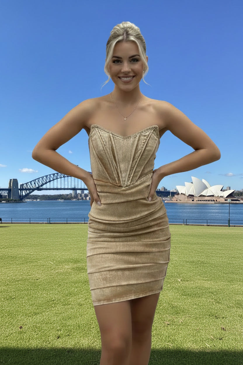 Woman in a beige denim corset dress 