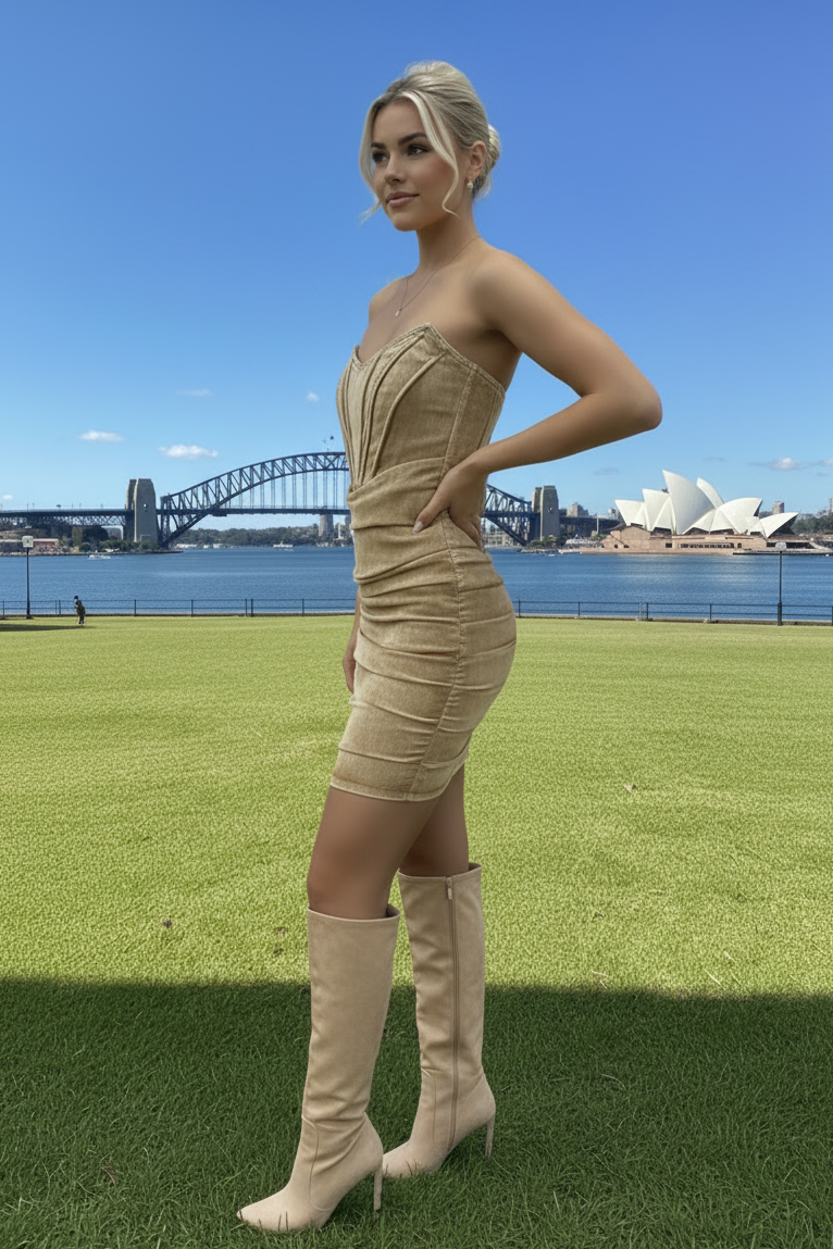 Woman in a beige denim corset dress 