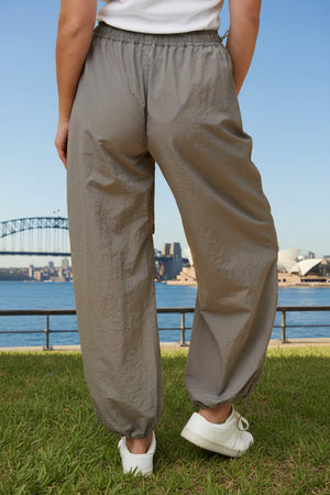 Person wearing grey cargo pants 