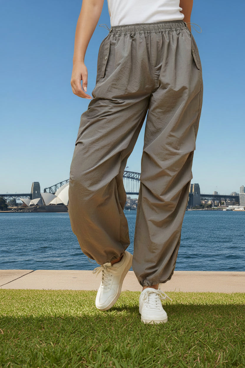 Woman in white top and beige cargo pants 