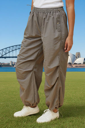 Person wearing grey cargo pants 