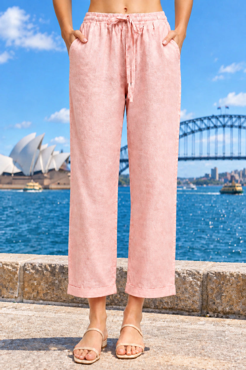 Light pink wide-leg cropped pants with an elastic drawstring waist