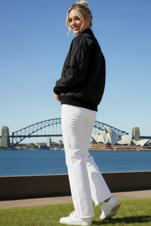Woman wearing a black quilted jacket