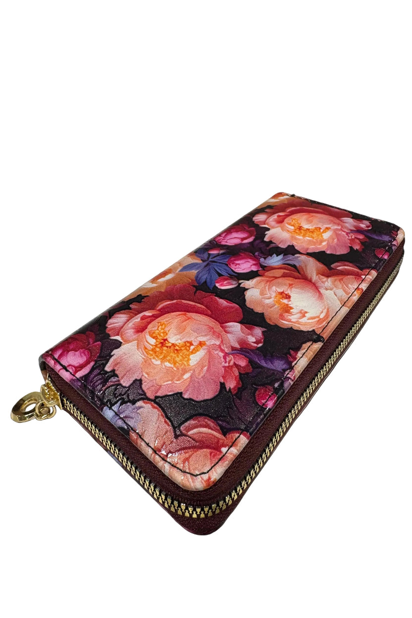 Floral patterned wallet with a gold zipper